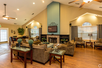 Recreation center with seating and kitchen